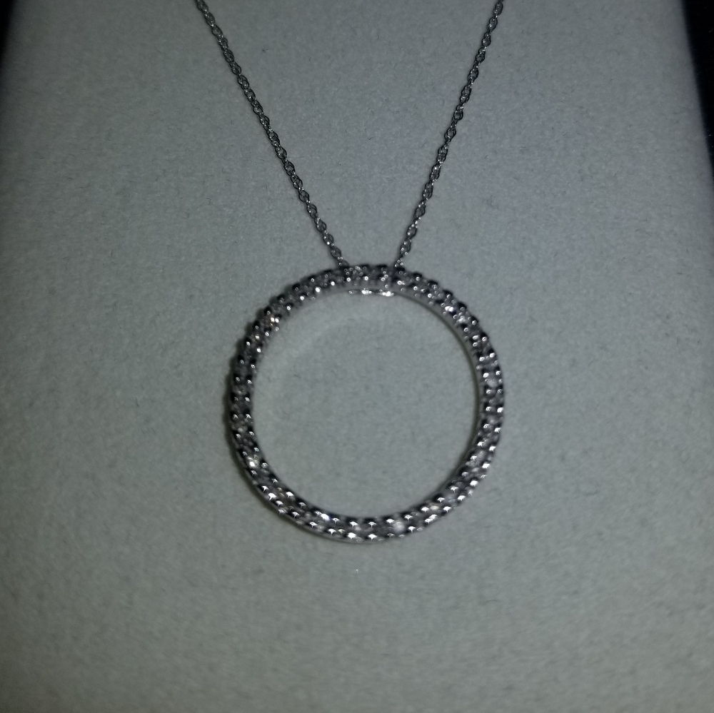 10kt White Gold Circle Pendant with diamonds